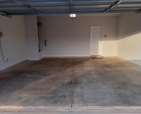 Garage Floor Epoxy Coating Before and After 1